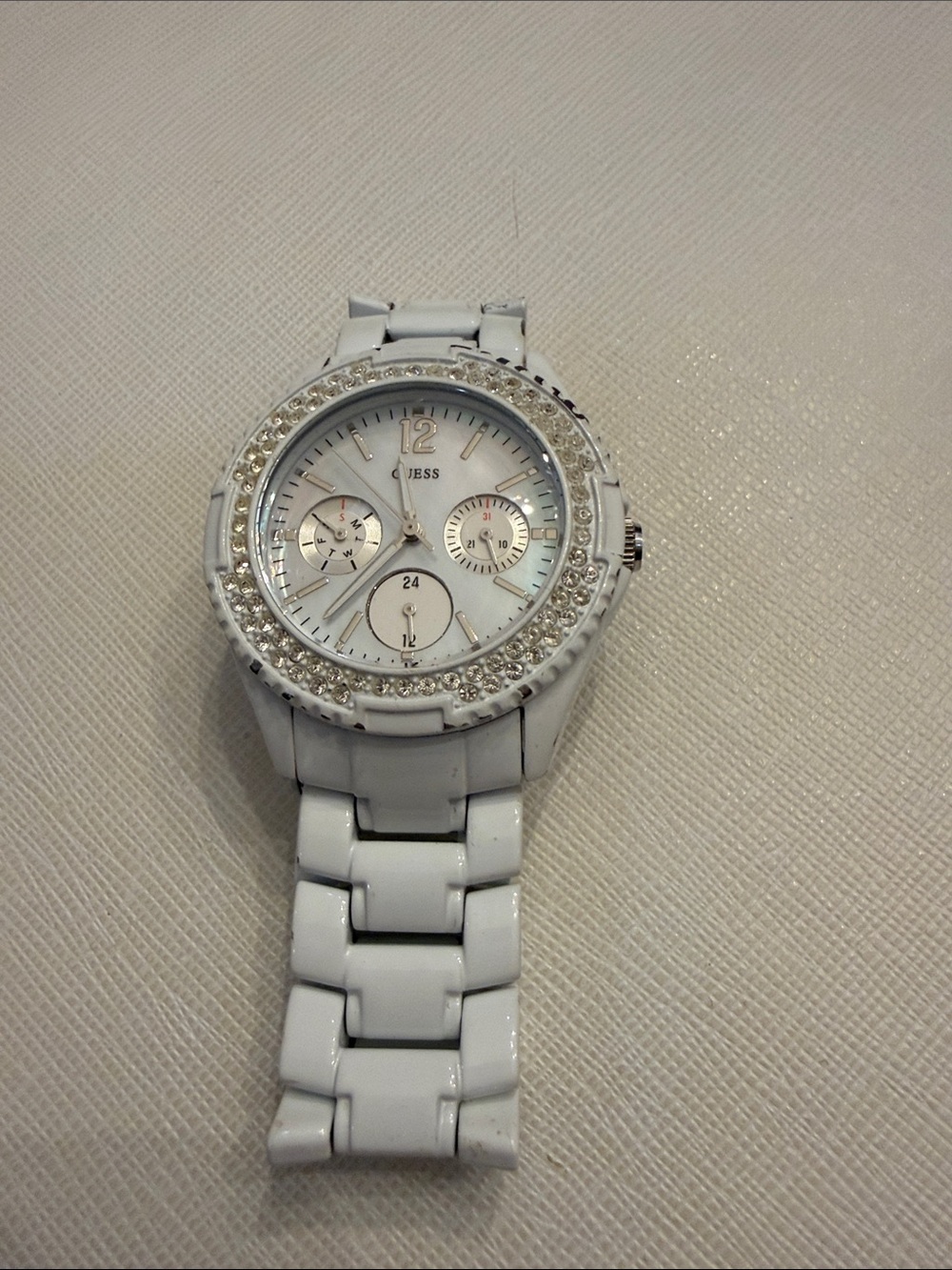 Guess Women's White Ceramic-Look Crystal Bezel Watch